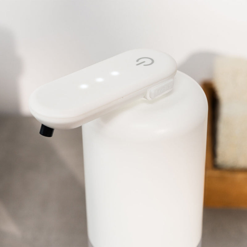 Tandpastadispenser med tandbørsteholder og automatisk sæbedispenser InnovaGoods